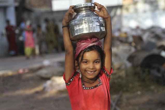 Girl Collecting water
